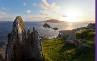 Ireland's cliffs with the sunset behind an island