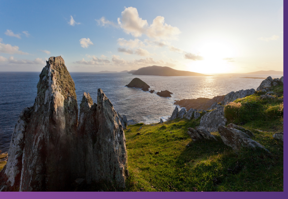 Ireland's cliffs with the sunset behind an island